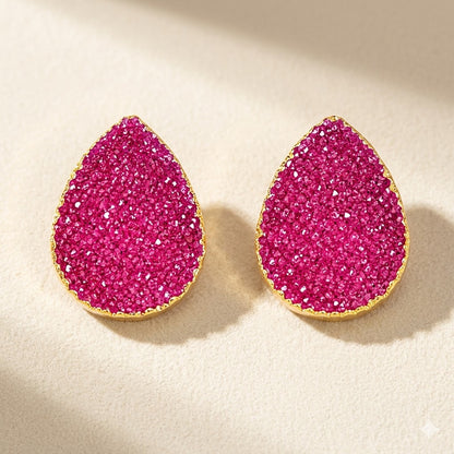 Magenta druzy teardrop stud earrings with gold-tone bezel