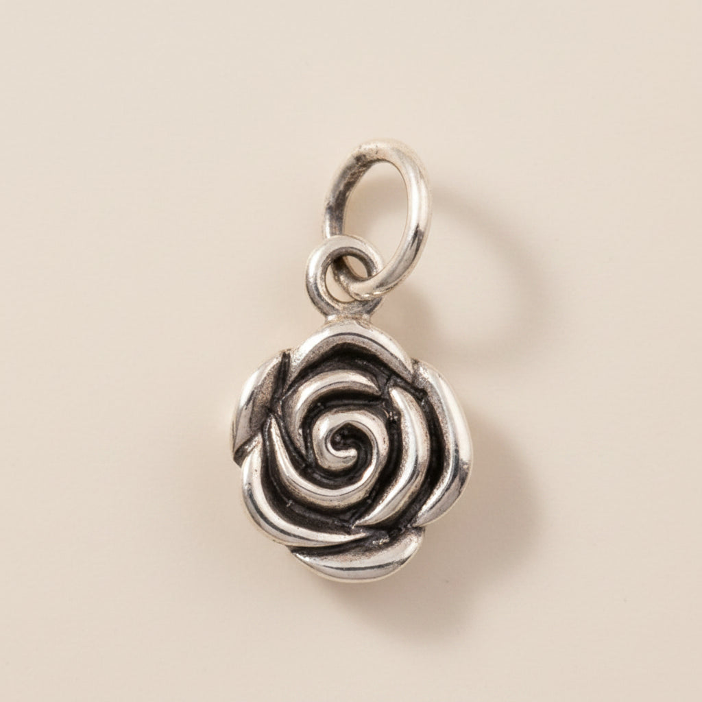 Silver-tone rose swirl pendant charm with hanging loop