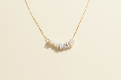 Keishi pearl row necklace with gold chain and white baroque pearls