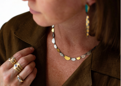 Hemi disc necklace with half-moon metal charms in silver and gold tones