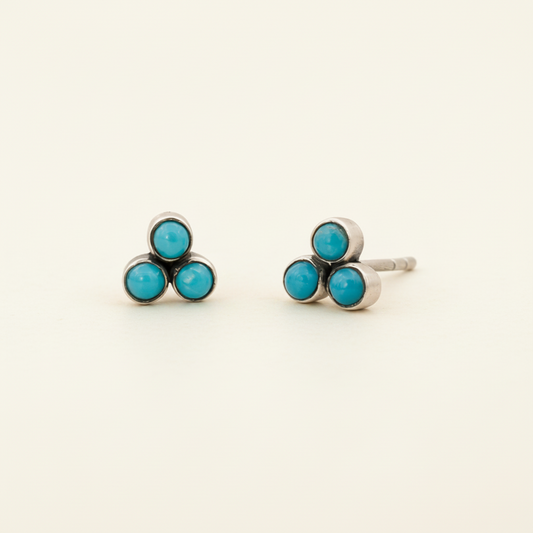 Turquoise clover stud earrings with three round turquoise stones in silver-tone bezels