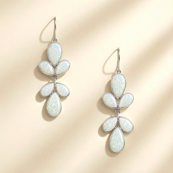 Opal blue flower-shaped drop earrings with teardrop petals