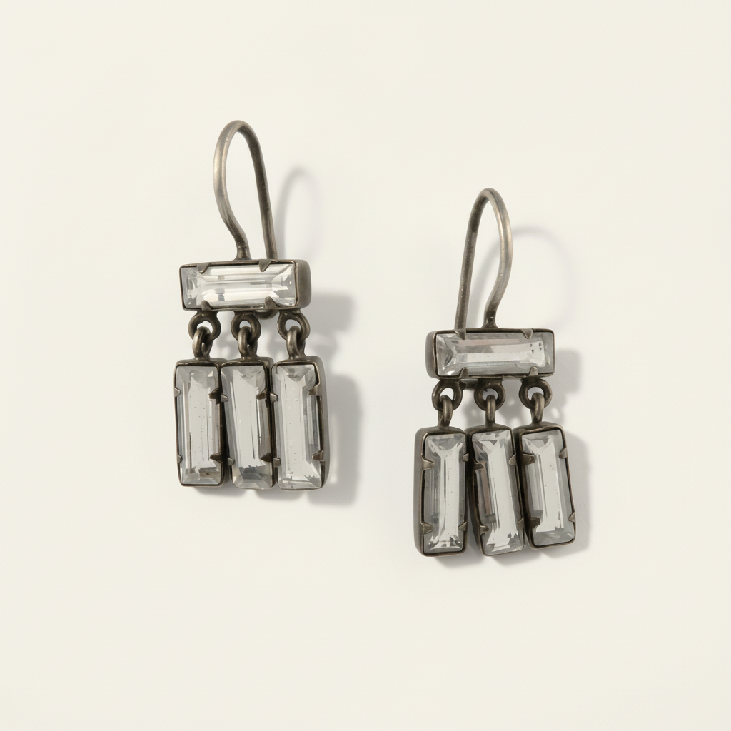 Silver-tone dangle earrings with clear baguette quartz rectangles and dangling tiers