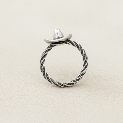 Sterling-style cowboy hat ring with twisted rope band and black accent trim