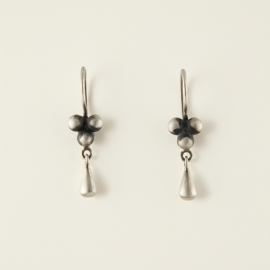 Ball cluster drop earrings with three dark bead spheres and teardrop dangles
