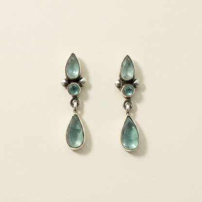 Pair of silver drop earrings with stacked blue-green teardrop stones