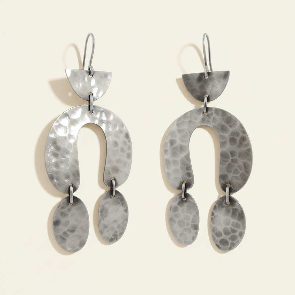 Hammered metal drop earrings, arched top with two dangling oval plates