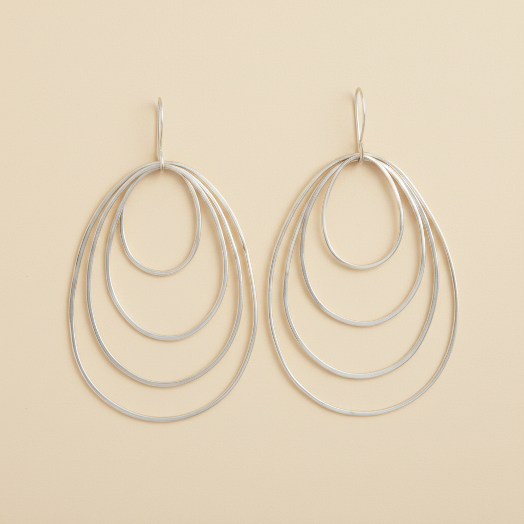 Silver-tone multi-loop hoop earrings with teardrop ring drops