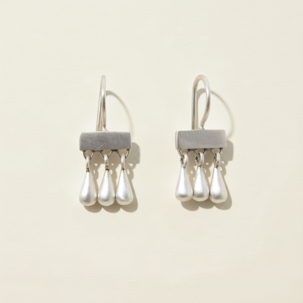 Silver-tone drop earrings with gray bar and dangling teardrop fringe beads