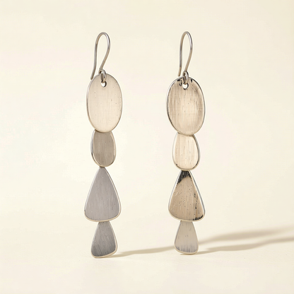 Silver-tone organic drop earrings with three stacked teardrop charms