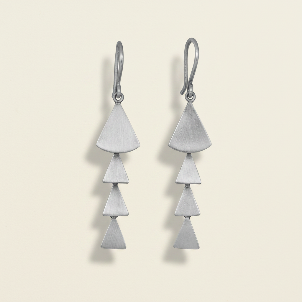 Silver long fan cascade earrings with three stacked triangular dangle charms