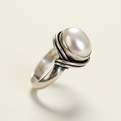 Sterling silver ring with large white pearl and three stacked wrap bands, size 8.5