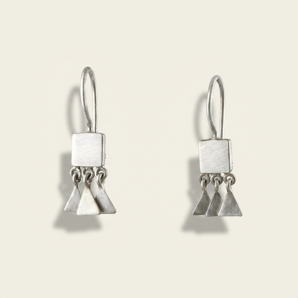 Silver tone square drop earrings with triangular dangle charms