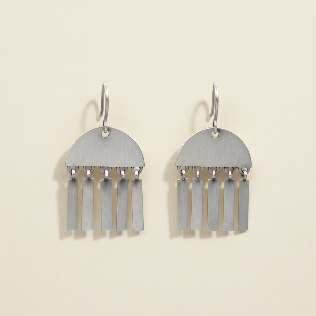 Silver-tone fringe dangle earrings with semicircle top and vertical tassel strips