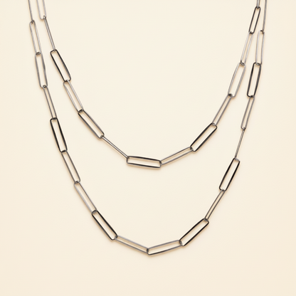 Layered paperclip-link chain necklace with curved bar links, silver-tone.