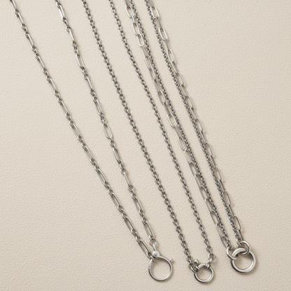 Sterling silver flat cable chain necklace with small round charm loops and clasp ends