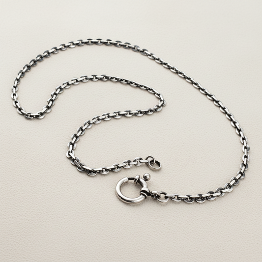Sterling silver charm chain necklace with flat cable links and round clasp charm ring