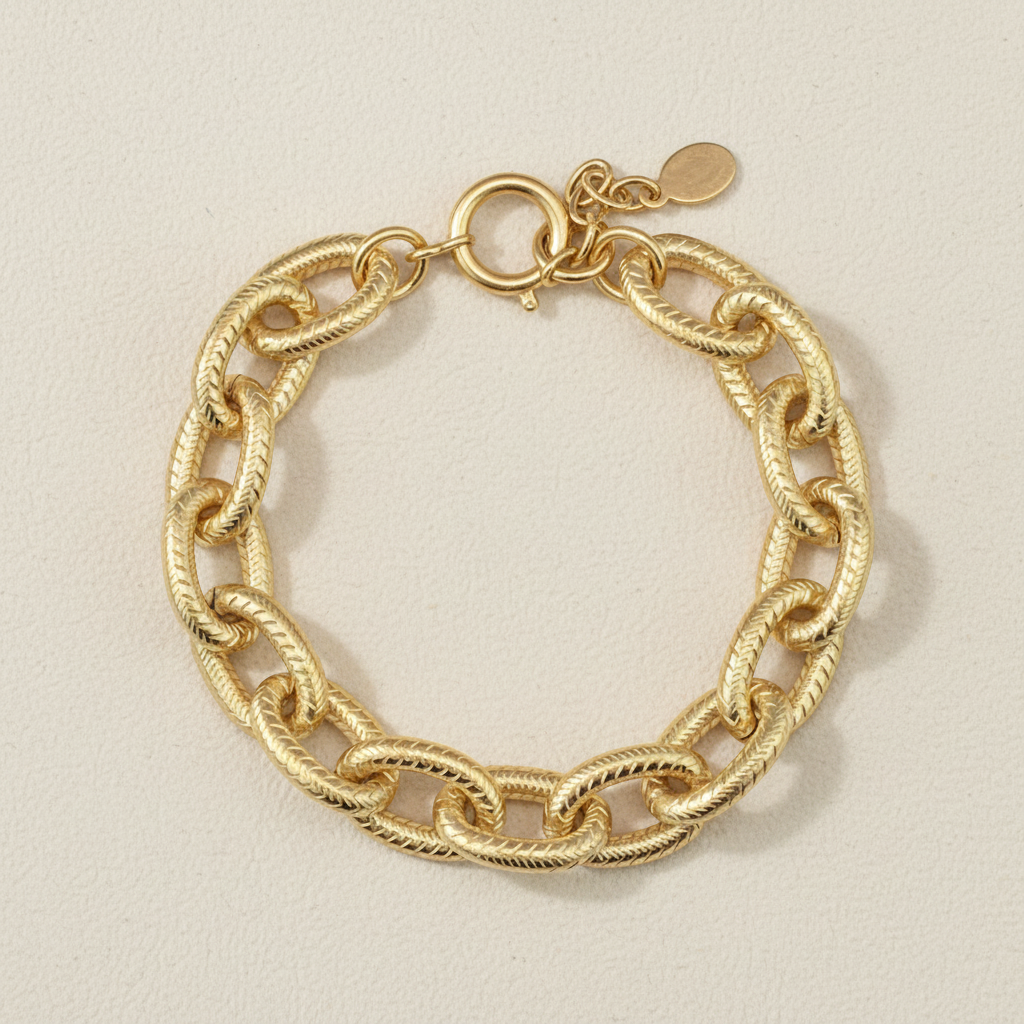 Chunky gold-tone chain bracelet with twisted links and round clasp