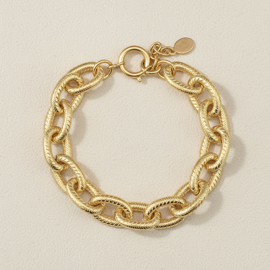 Chunky gold-tone chain bracelet with twisted links and round clasp