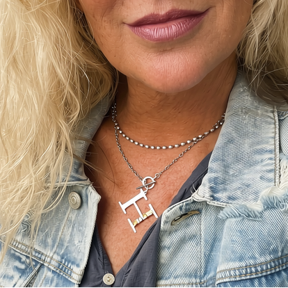 Silver twisted chain necklace with toggle clasp and pendant letter T