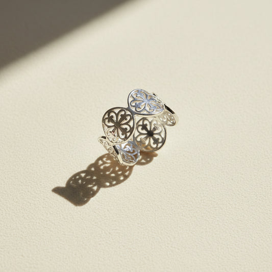 Filigree circles ring with silver-tone openwork and gold-tone accents