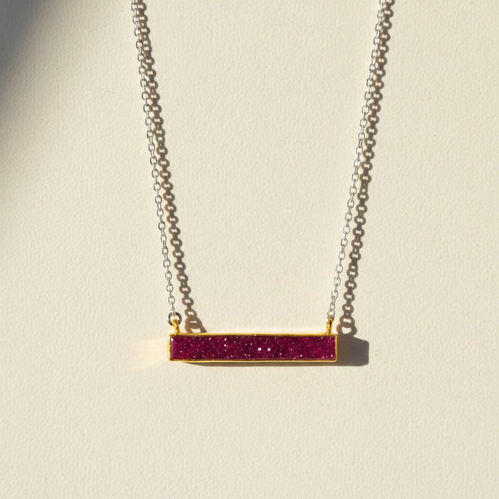 Two-tone druzy bar necklace with magenta purple rectangular pendant on gold chain