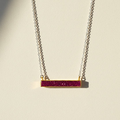 Two-tone druzy bar necklace with magenta purple rectangular pendant on gold chain