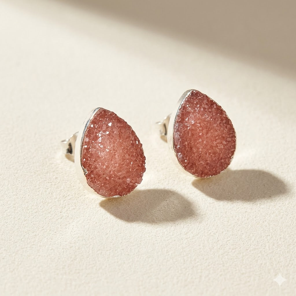Peach druzy teardrop stud earrings with silver-tone metal settings