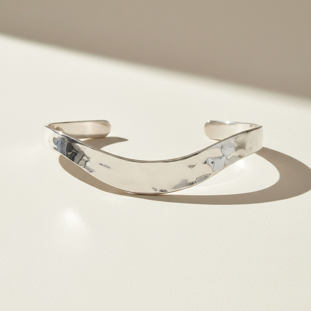 Hammered wave cuff bracelet, polished silver-tone with wavy opening
